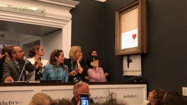 Проданная за 1,4 млн долларов картина Бэнкси самоуничтожилась во время аукциона
