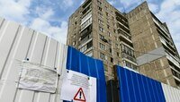 Громкоговоритель и вода в баклажках: как живёт непокорная высотка на Московском, 68 (фото)